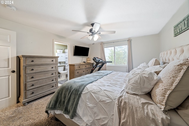 bedroom with carpet flooring, ensuite bath, and ceiling fan