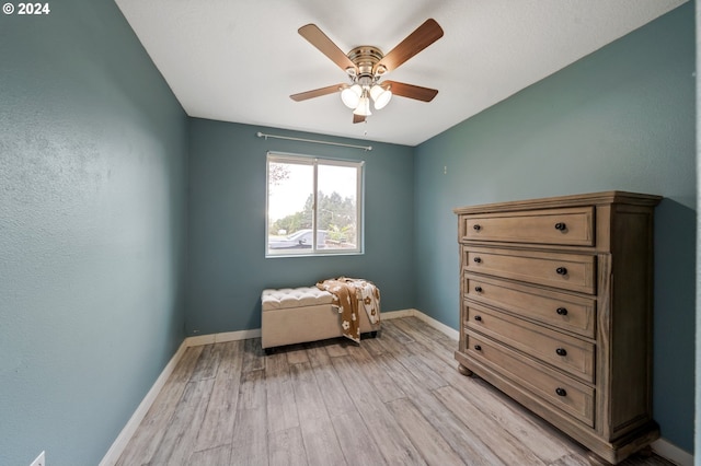 unfurnished room with ceiling fan and light wood-type flooring