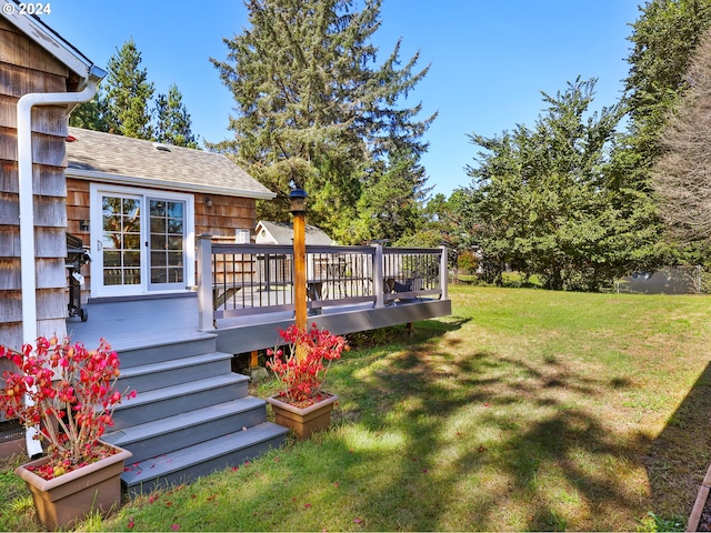 view of yard with a wooden deck