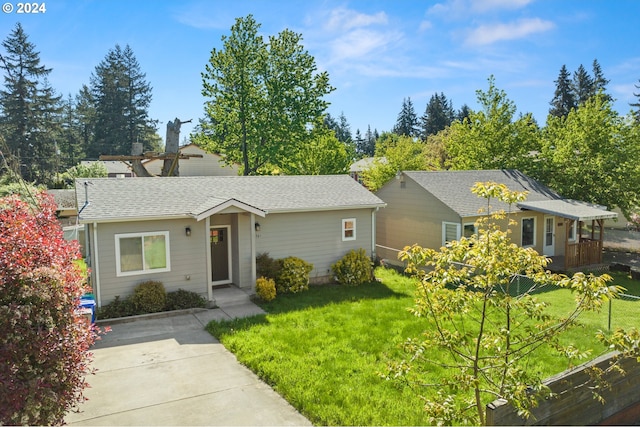 single story home with a front yard