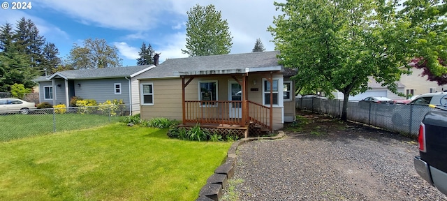 bungalow with a front yard