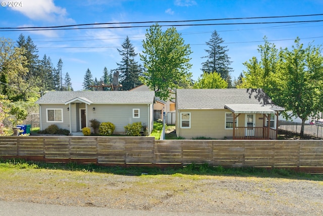 236 NE 156th Ave Unit A & B, Portland, OR 97230 - single story home with a fenced front yard and roof with shingles
