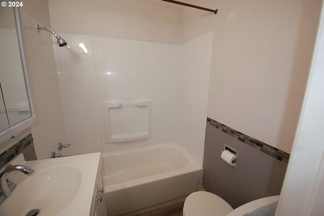 full bathroom with vanity, toilet, and bathing tub / shower combination