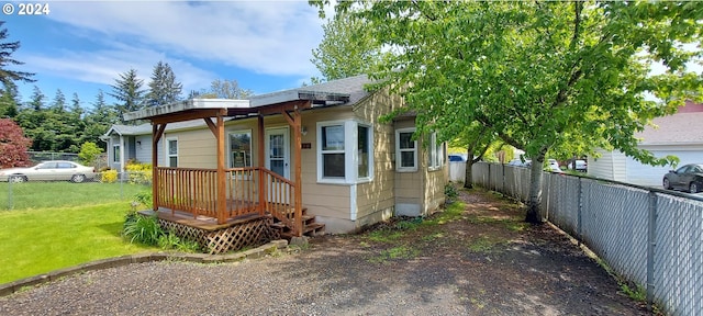 exterior space with a front yard