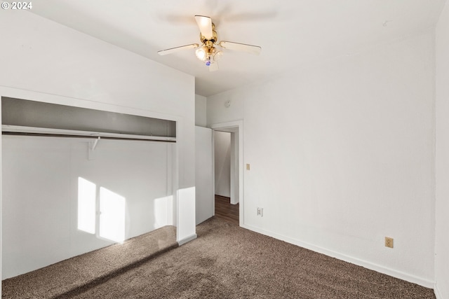 unfurnished bedroom featuring carpet, a closet, and ceiling fan