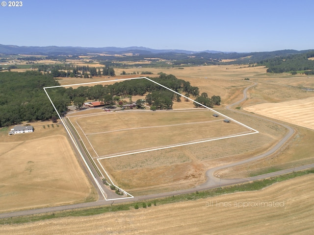 aerial view with a rural view and a mountain view