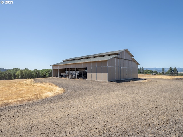 view of outdoor structure featuring a rural view