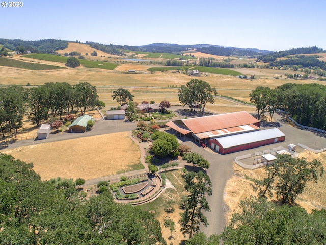 birds eye view of property featuring a rural view