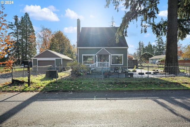 7010 SE Lamphier St, Milwaukie, OR 97222 - bungalow-style home featuring a detached garage, a chimney, and a fenced front yard