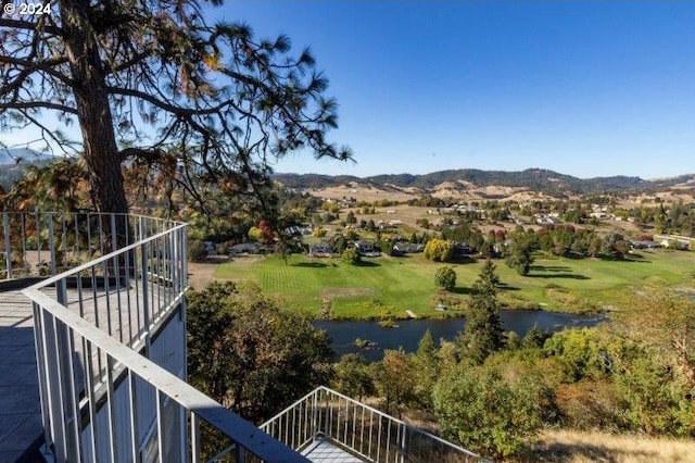 view of mountain feature featuring a water view