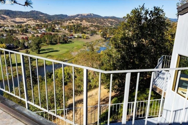 balcony featuring a mountain view