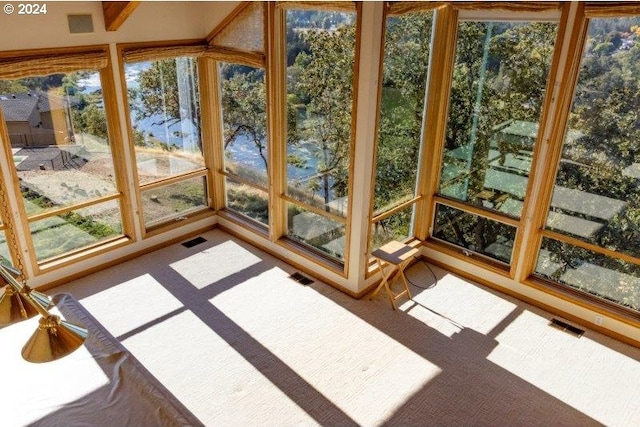 sunroom / solarium with a healthy amount of sunlight