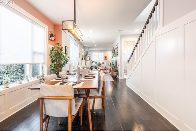 dining room featuring dark hardwood / wood-style flooring