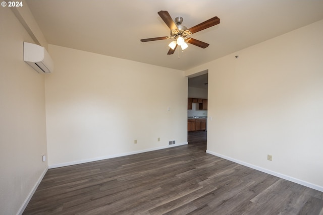 spare room featuring hardwood / wood-style floors