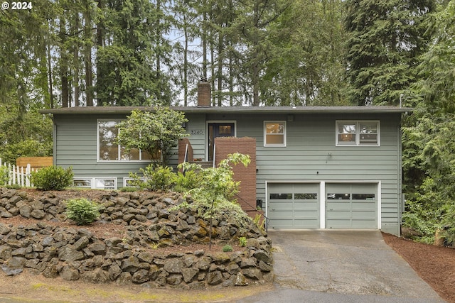 view of front of property with a garage