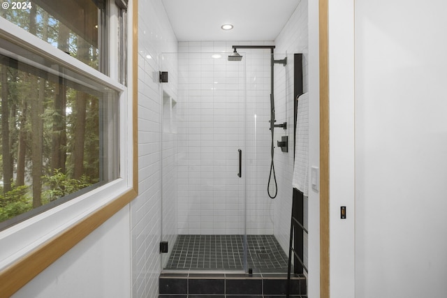 bathroom with an enclosed shower