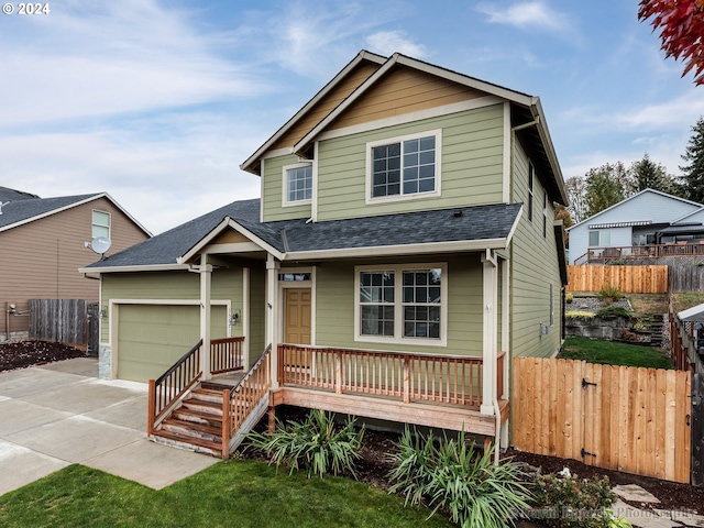 view of front of home with a garage and covered porch