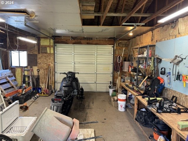 garage with a workshop area