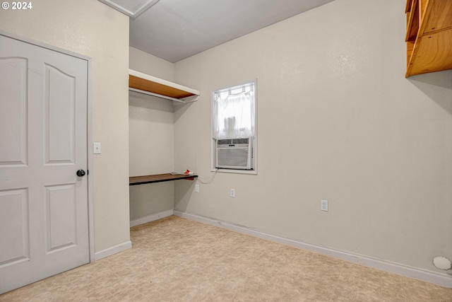 spacious closet featuring cooling unit