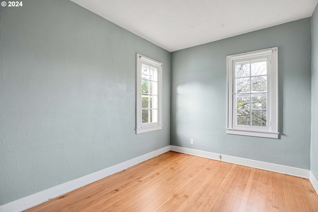 1175 Hines St SE, Salem, OR 97302 - spare room with hardwood / wood-style floors and baseboards