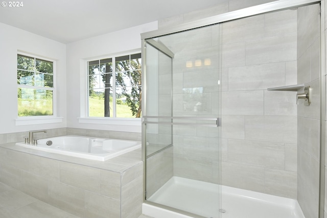 bathroom with independent shower and bath