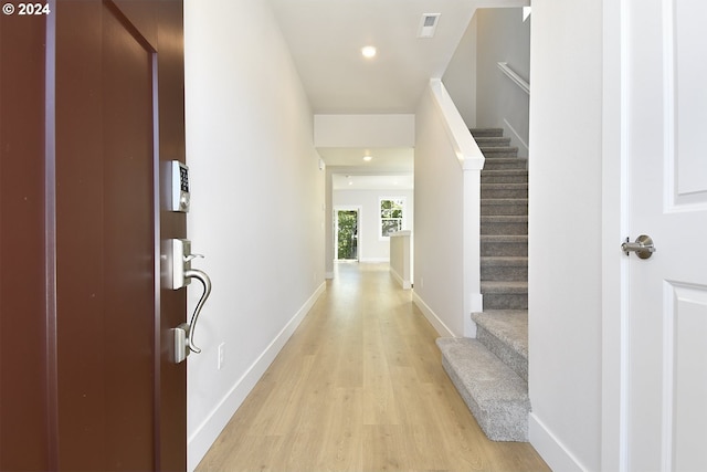 corridor featuring light wood-type flooring