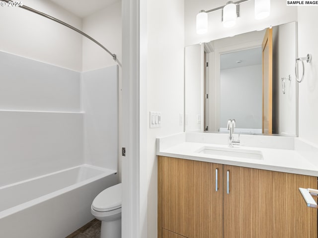 full bathroom featuring toilet, bathtub / shower combination, and vanity