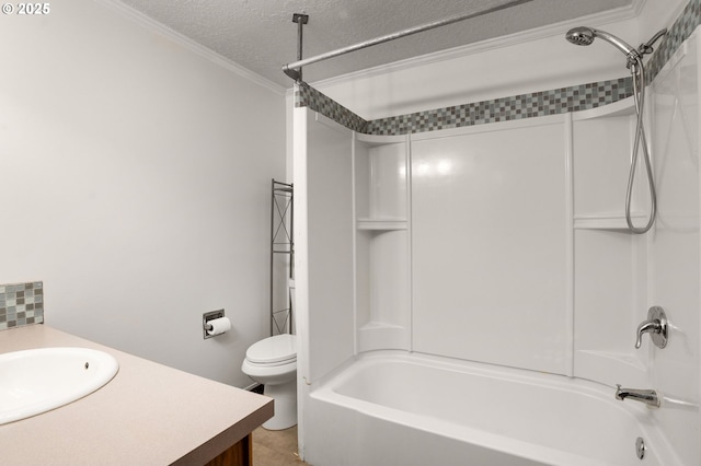 full bathroom featuring vanity, bathtub / shower combination, a textured ceiling, and toilet