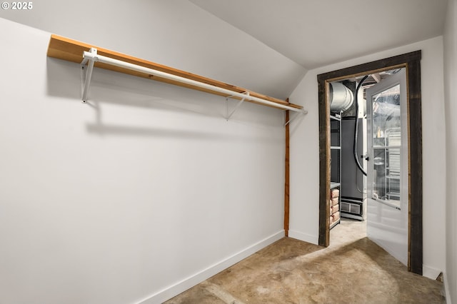 spacious closet with lofted ceiling