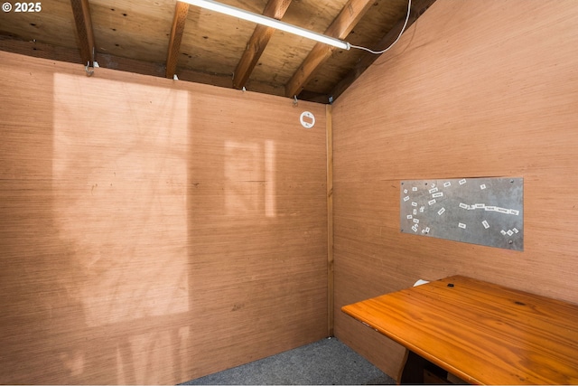 interior space featuring wooden walls