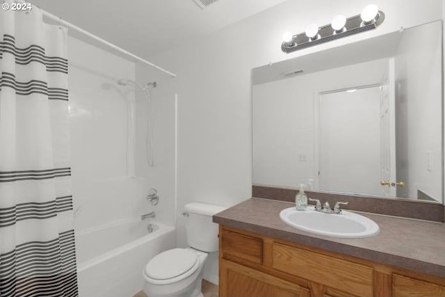 full bathroom with shower / bath combination with curtain, vanity, and toilet