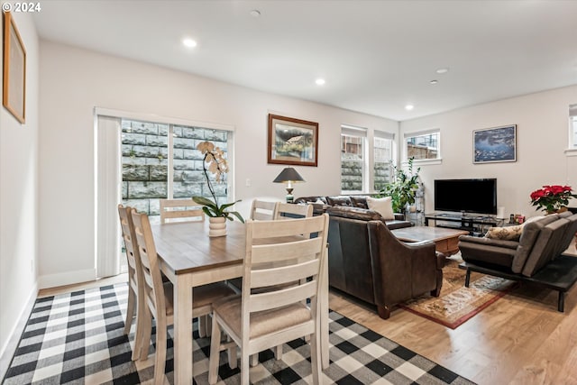 dining area with light hardwood / wood-style flooring