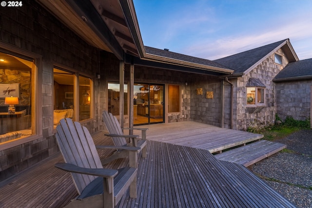 view of deck at dusk