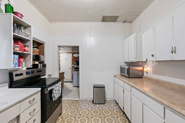 kitchen with white cabinetry and stainless steel appliances