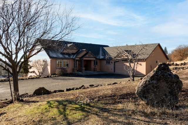 ranch-style home with a garage