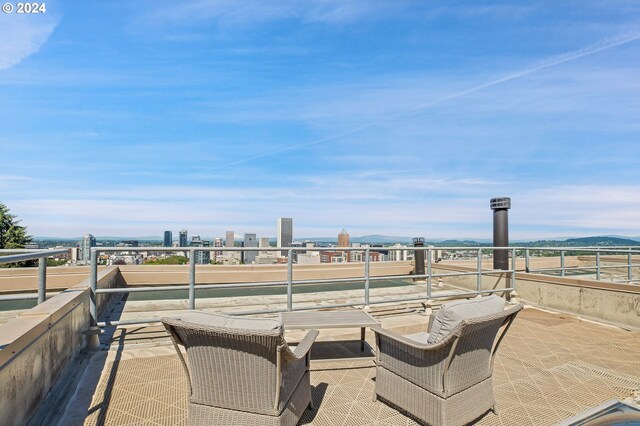 view of patio / terrace featuring a balcony