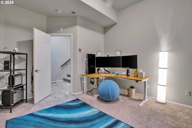 bedroom featuring light carpet