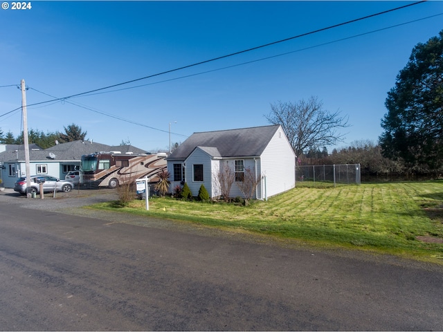 view of front of property with a front lawn