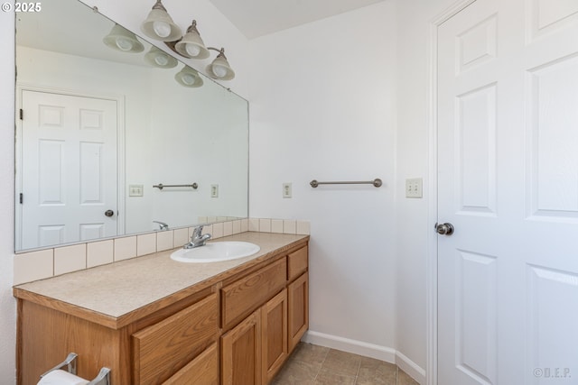 bathroom with tile patterned flooring and vanity