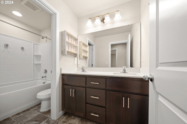 full bathroom featuring toilet, shower / bath combination, and vanity