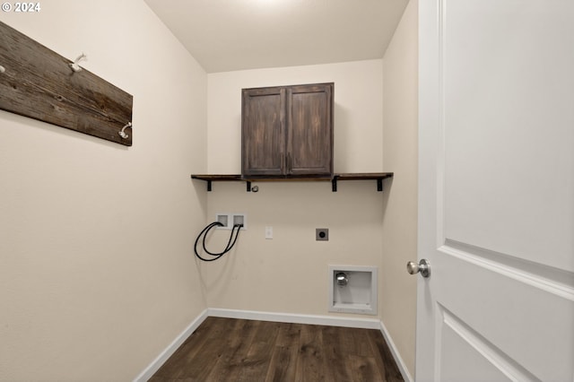 clothes washing area with dark wood-type flooring, electric dryer hookup, hookup for a washing machine, and cabinets