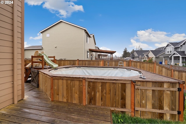 exterior space featuring a jacuzzi