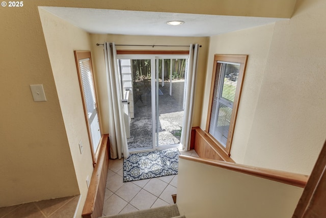 3329 SE Steele St, Portland, OR 97202 - entryway featuring a textured wall and light tile patterned floors