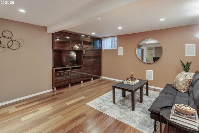 3329 SE Steele St, Portland, OR 97202 - living area featuring wood finished floors and recessed lighting