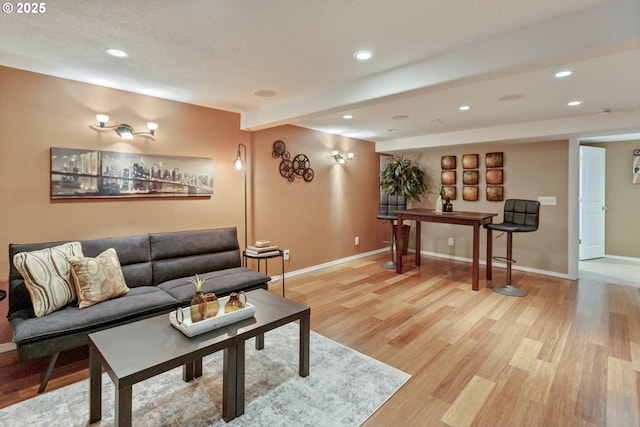 3329 SE Steele St, Portland, OR 97202 - living area with light wood-style floors and recessed lighting