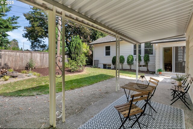 3329 SE Steele St, Portland, OR 97202 - fenced backyard featuring a patio area