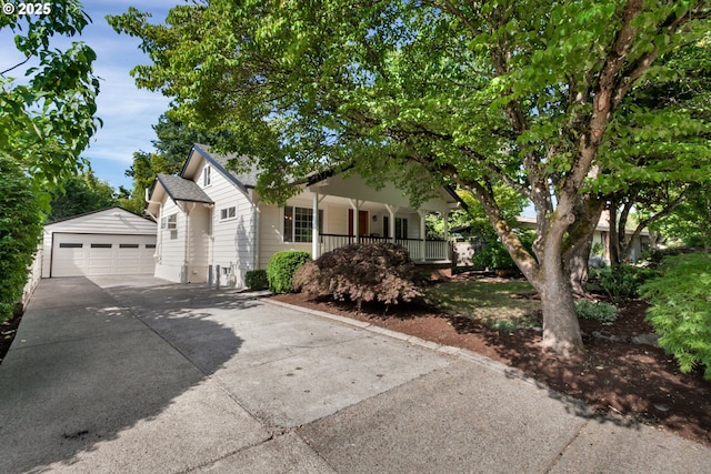 3329 SE Steele St, Portland, OR 97202 - view of front of property with an outdoor structure, a porch, and a garage