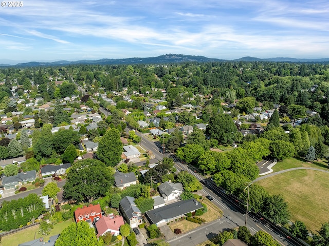 3329 SE Steele St, Portland, OR 97202 - aerial perspective of suburban area with a mountainous background