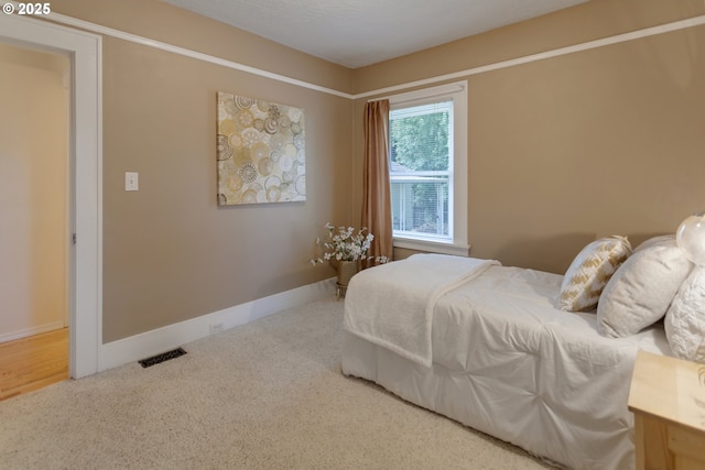 3329 SE Steele St, Portland, OR 97202 - carpeted bedroom with baseboards