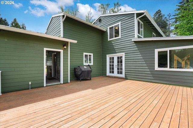 wooden deck with grilling area and french doors